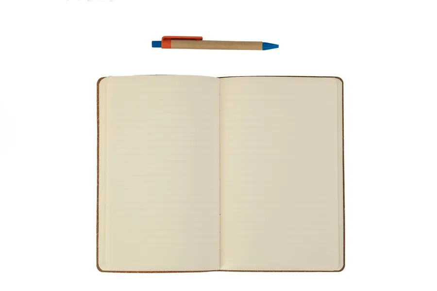 An open notebook and pen on a plain background