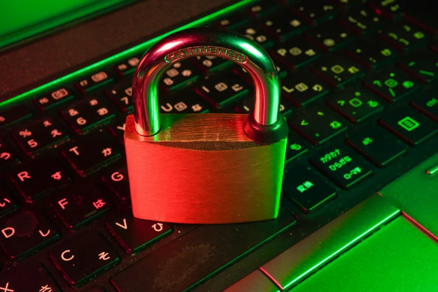 A red padlock on a computer keyboard